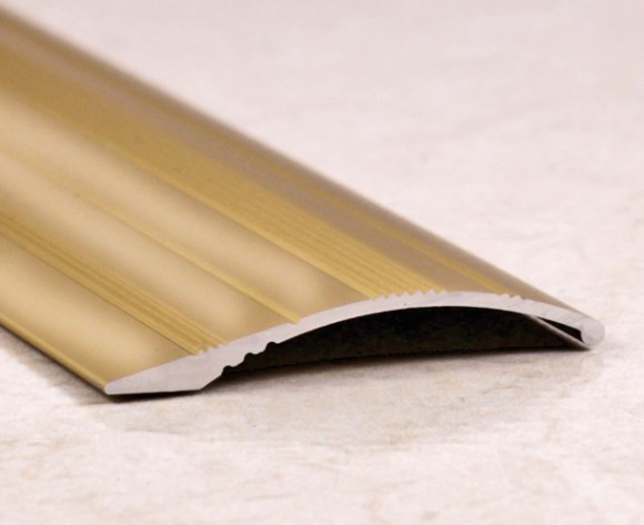 Разноуровневый порог алюминиевый с рифлением 39 мм ПО-39х6 золото глянец 2,7 м