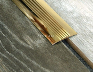 Порог-стык 38 мм с рифлением Cezar LPOR 38 1,8 м латунь полированная с отверстием